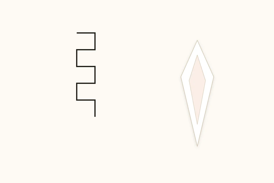 Strip of paper folded in a zigzag beside a hexagonal paper ornament