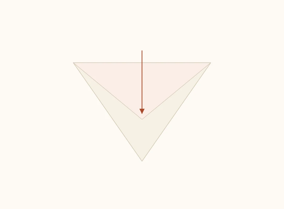 Paper triangle with the front layer folded down and the back layer still standing